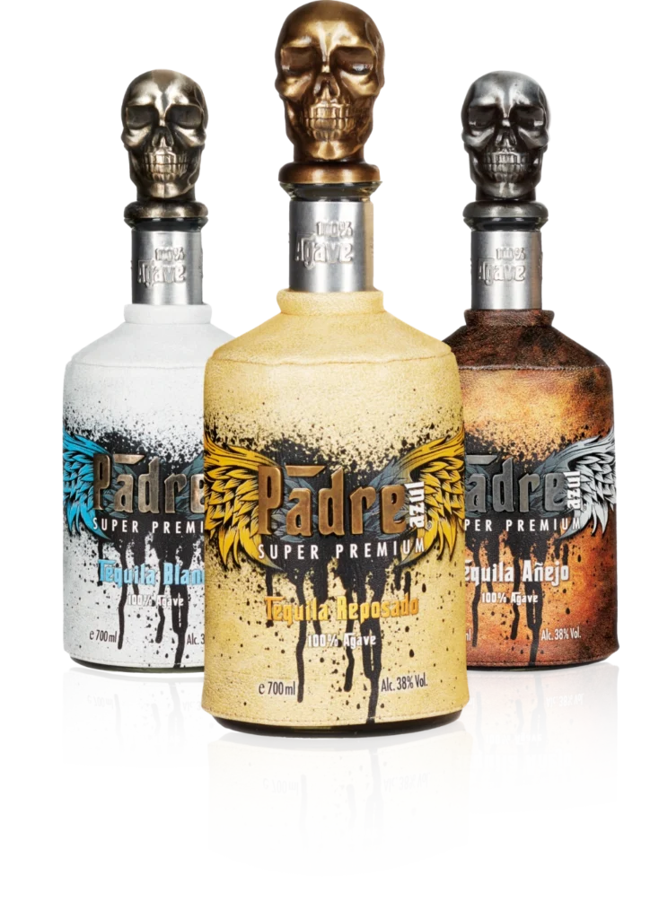 Three Padre Azul Tequila bottles. Left is the white Blanco, in the middle the yellow Reposado and on the right side the brown Añejo bottle.